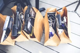 paper bags with handles stuffed with packaged goods
